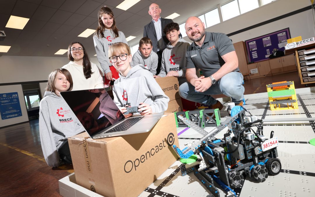 CMYK Business Technology supports client Opencast to donate a dozen MacBook laptops